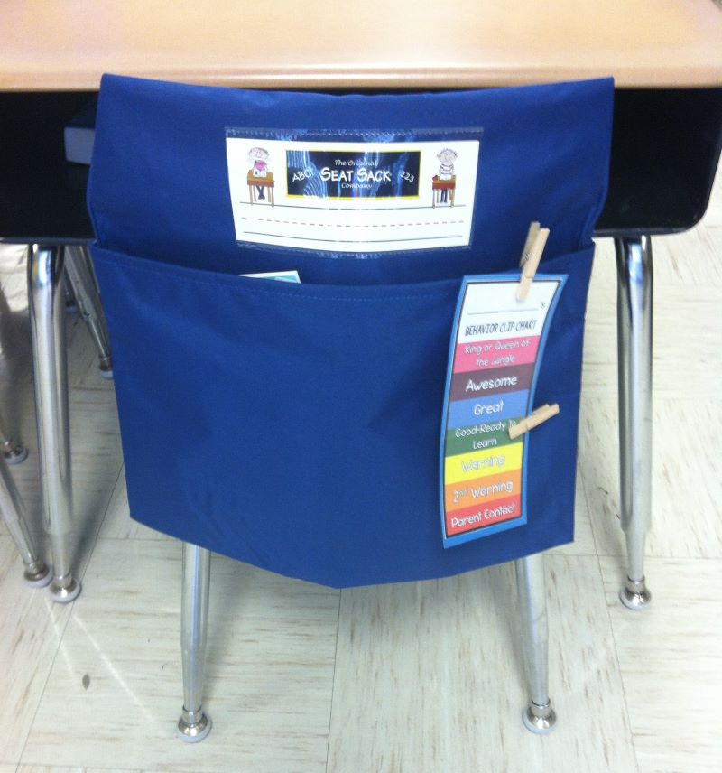 Seat Sack with behavior chart clipped on for easy access